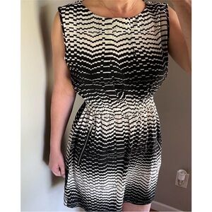 Feathers black and white dress size extra large with two front zipper pockets